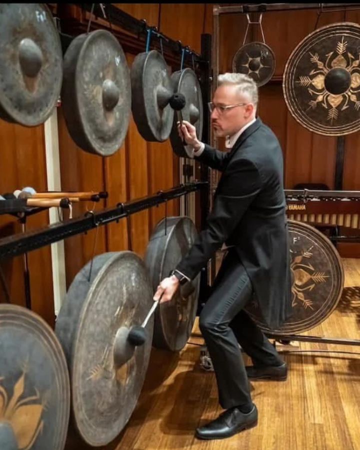 Jason Niehoff performing on gongs with the National Symphony Orchestra